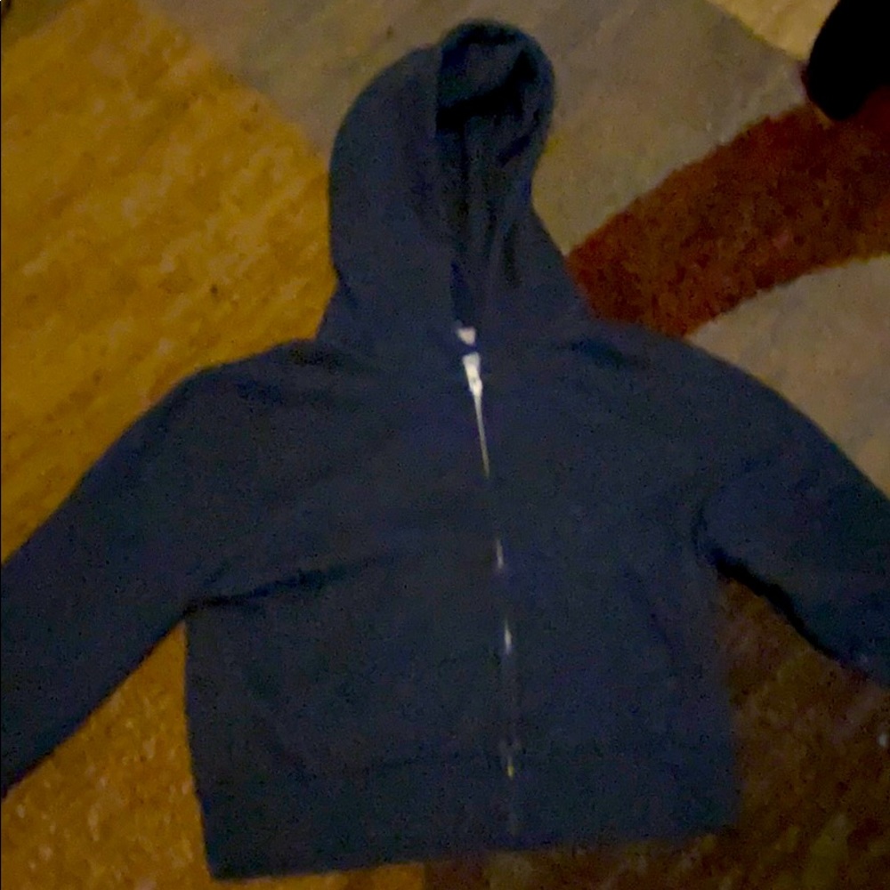 I am selling a brand Melville zip up crop top